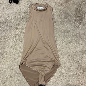 Mock neck tan body suit